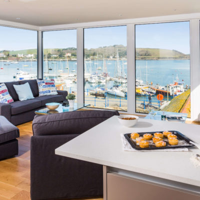 Watch House open plan living room with views of the harbour - Falmouth Holiday Homes | Pawfect Stays