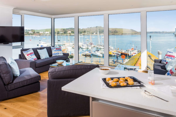 Watch House open plan living room with views of the harbour - Falmouth Holiday Homes | Pawfect Stays