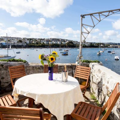 Alfresco dining at Riverside - Falmouth Holiday Homes | Pawfect Stays